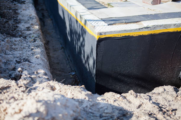 Professional Emergency Waterproofing technician working in Telford, PA